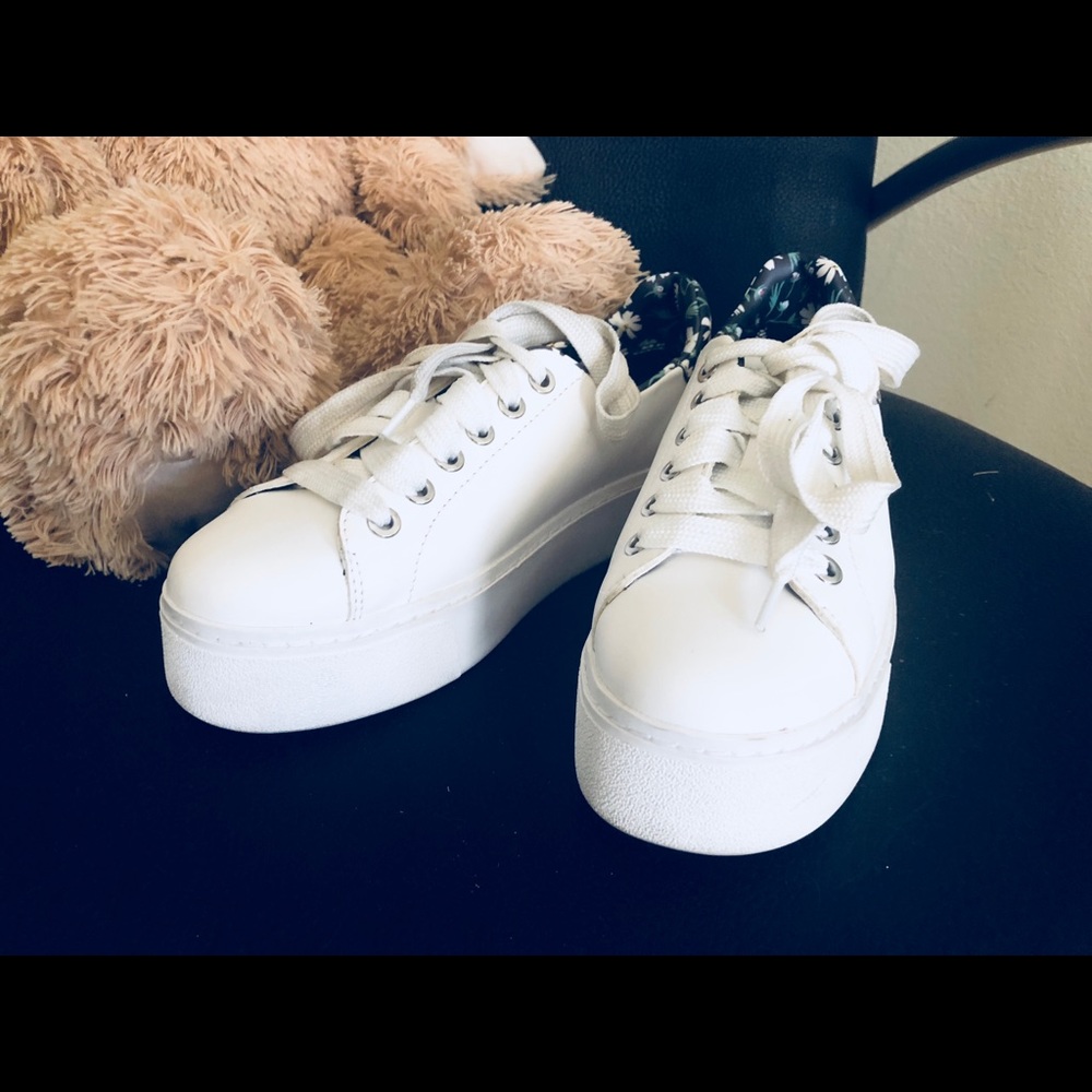 BCBG platform white/flowered sneakers.